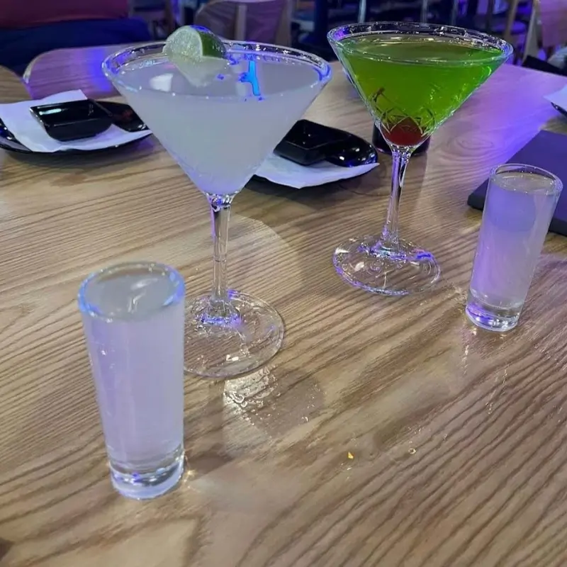 Apple - flavored martini with a lime slice at Hungry Bowl, a Buffet Restaurant in Bowie