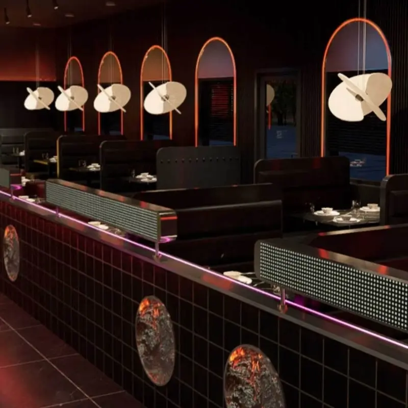 Private dining space with booths and unique lights at Hungry Bowl, a Buffet Restaurant in Bowie
